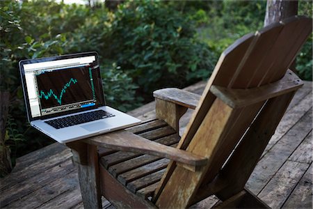 Still Life of a Laptop Computer on a Chair Stock Photo - Rights-Managed, Code: 700-03014797