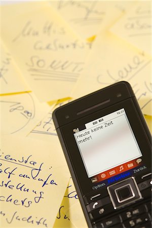 self adhesive note - Close-up of Text Message and Sticky Notes Stock Photo - Rights-Managed, Code: 700-03016999