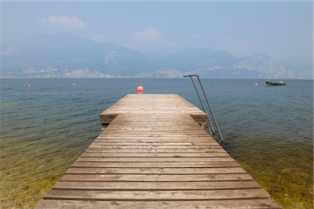 Dock on Lago di Garda, Verona Province, Veneto, Italy Stock Photo - Rights-Managed, Code: 700-03018041