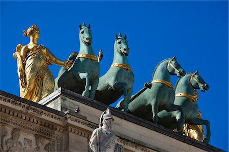 simsearch:700-02633773,k - Statues atop the Arc de Triomphe du Carrousel, Jardin des Tuileries, Paris, France Stock Photo - Rights-Managed, Code: 700-03068468