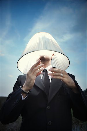 Businessman Wearing Lampshade Stock Photo - Rights-Managed, Code: 700-03075124