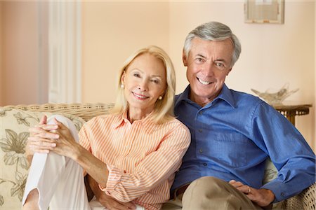 Portrait of Couple Sitting on Sofa Stock Photo - Rights-Managed, Code: 700-03075348