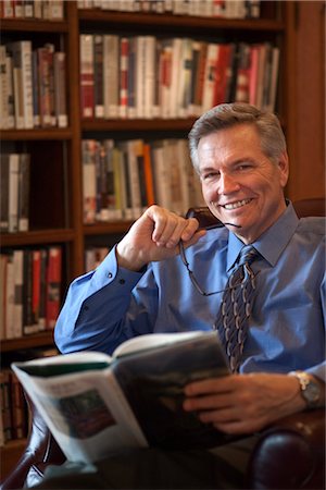 Man Reading in a Library Stock Photo - Rights-Managed, Code: 700-03152536