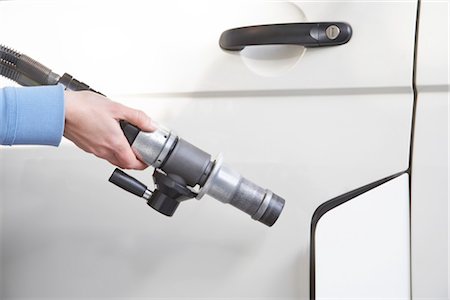 Woman Pumping Gas Stock Photo - Rights-Managed, Code: 700-03178772