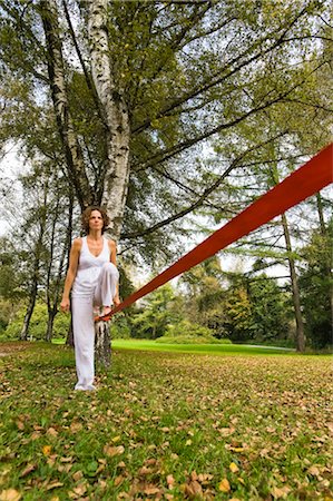 red ropes - Woman Slacklining Stock Photo - Rights-Managed, Code: 700-03179156