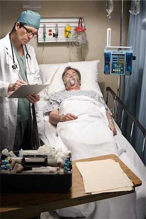 people with oxygen masks - Emergency Room Doctor Stock Photo - Rights-Managed, Code: 700-03210511