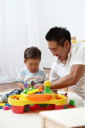 Father and Son Playing Together Stock Photo - Rights-Managed, Code: 700-03240587