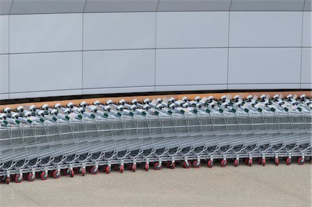 Row of Grocery Carts Lined-up Stock Photo - Rights-Managed, Code: 700-03284205