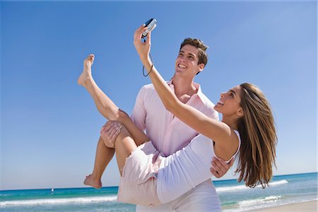 Playful Couple on the Beach Stock Photo - Rights-Managed, Code: 700-03294825