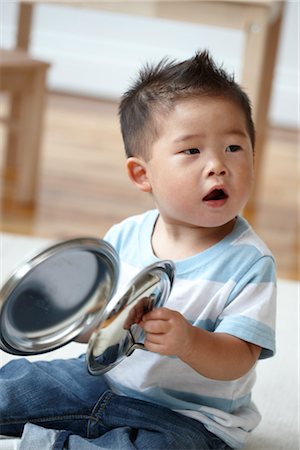 Baby Boy Playing with Pots and Pans Stock Photo - Rights-Managed, Code: 700-03294885