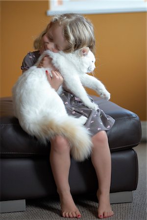 Little Girl Hugging a Ragdoll Cat Stock Photo - Rights-Managed, Code: 700-03295270