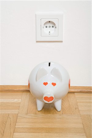 Piggy Bank by Electrical Outlet Stock Photo - Rights-Managed, Code: 700-03298885