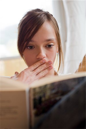 Teenage Girl Reading Book Stock Photo - Rights-Managed, Code: 700-03333125