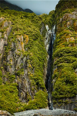 Waterfall, Franz Josef Glacier, South Island, New Zealand Stock Photo - Rights-Managed, Code: 700-03333642