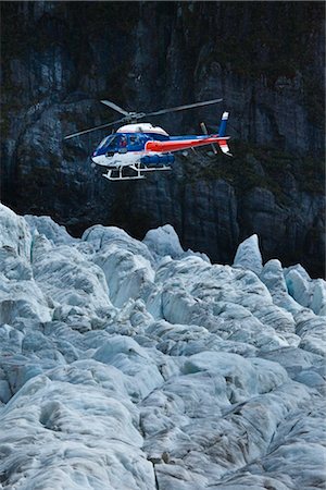 Helicopter landing on Franz Josef Glacier, South Island, New Zealand Stock Photo - Rights-Managed, Code: 700-03333657