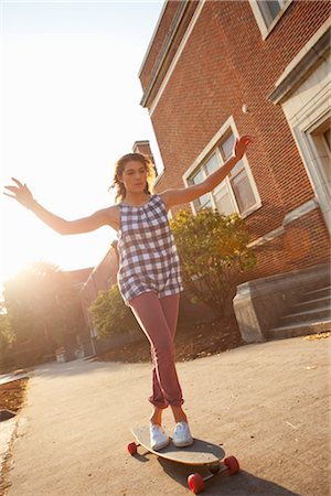 Woman Skateboarding, Portland, Oregon, USA Stock Photo - Rights-Managed, Code: 700-03404753