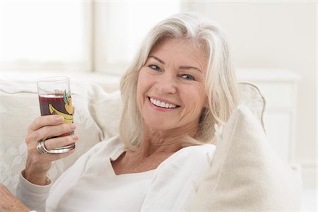 Woman Drinking a Glass of Juice Stock Photo - Rights-Managed, Code: 700-03439015
