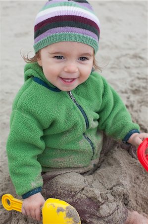 Close-up pf Baby Girl Sitting on Beach, Near Newport, Oregon, USA Stock Photo - Rights-Managed, Code: 700-03439518