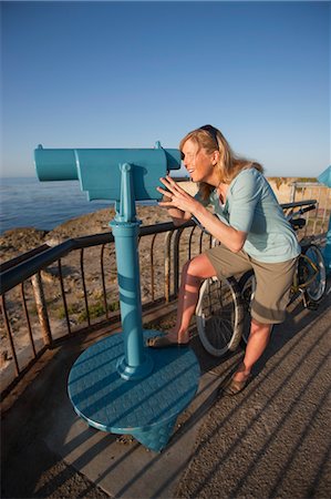 Woman Looking at the Pacific Ocean Through a View Finder, Santa Cruz, California, USA Stock Photo - Rights-Managed, Code: 700-03439940