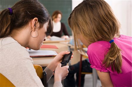 fundamental - Student Texting in Class Stock Photo - Rights-Managed, Code: 700-03445080