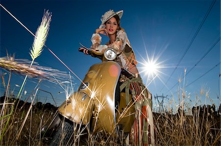 Woman on Scooter in Field Stock Photo - Rights-Managed, Code: 700-03445566