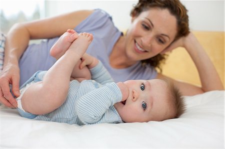 simsearch:700-06645599,k - Mother and Baby on Bed Stock Photo - Rights-Managed, Code: 700-03455666
