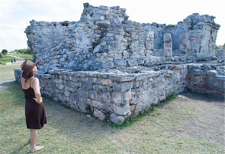 Woman Looking at Mayan Ruins, Tulum, Mexico Stock Photo - Rights-Managed, Code: 700-03456773