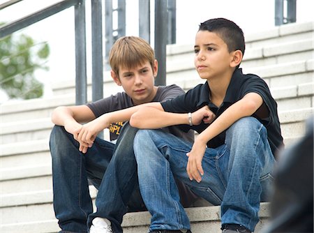 Two Teenage Boys Sitting on Steps Stock Photo - Rights-Managed, Code: 700-03456797