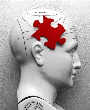 solution concept - Red Puzzle Piece on Phrenology Head Stock Photo - Rights-Managed, Code: 700-03451463