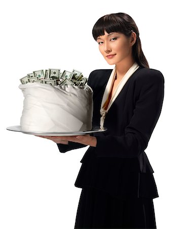 simsearch:600-03768654,k - Businesswoman holding Bag of Money on Silver Tray Stock Photo - Rights-Managed, Code: 700-03466512