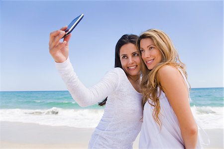 Women Taking Picture with Cellular Telephone Stock Photo - Rights-Managed, Code: 700-03466805