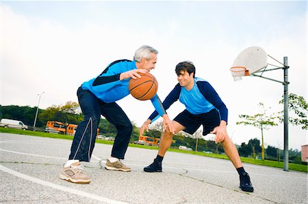 exercising with friend - Father and Son Playing Basketball Stock Photo - Rights-Managed, Code: 700-03506303