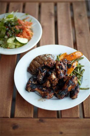 Organic Jerk Chicken, Steak and Roasted Vegetables with Salad Stock Photo - Rights-Managed, Code: 700-03508565