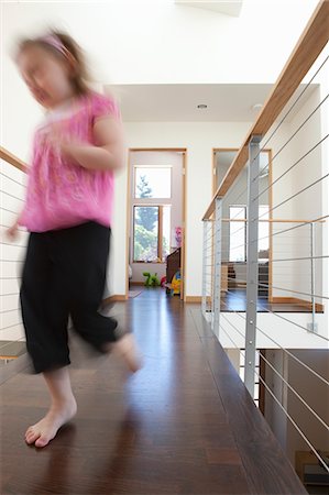 Girl Running in Hall of Home, Portland, Oregon, USA Stock Photo - Rights-Managed, Code: 700-03502905