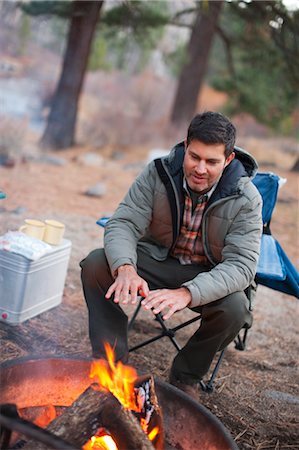 fire pit - Man Warming Hands by Campfire, Truckee, near Lake Tahoe, California, USA Stock Photo - Rights-Managed, Code: 700-03503051