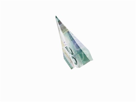 Paper Airplane Made Out of Canadian Currency Stock Photo - Rights-Managed, Code: 700-03554391