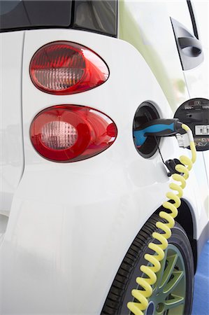 simsearch:700-01694250,k - Close-up of Electric Car Being Charged Stock Photo - Rights-Managed, Code: 700-03556769