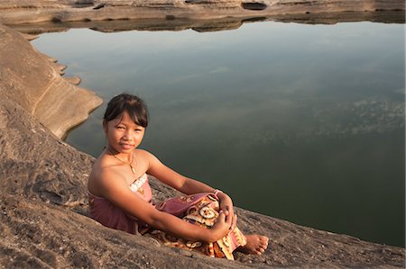 simsearch:700-08743683,k - Girl Sitting by Pond at SamPanBok, Ubon Ratchathani Province, Thailand Stock Photo - Rights-Managed, Code: 700-03567869