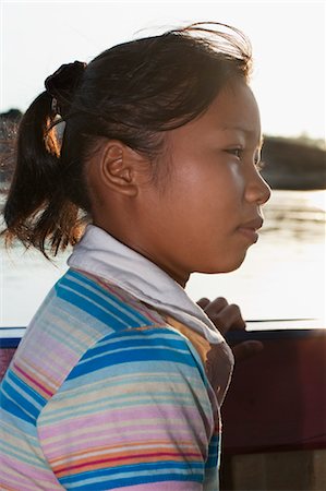 simsearch:700-08743683,k - Profile of Girl in Tourist Boat, Mekong River, Thailand Stock Photo - Rights-Managed, Code: 700-03567862