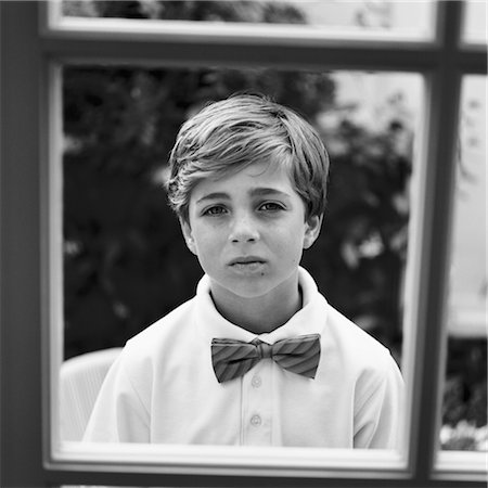 picture kid sad window - Portrait of Little Boy, Newport Beach, Orange County, California, USA Stock Photo - Rights-Managed, Code: 700-03567883