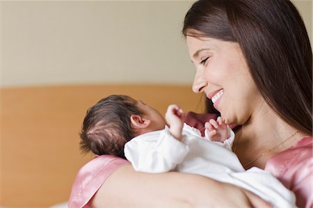 Mother Holding Infant Daughter Foto de stock - Con derechos protegidos, Código: 700-03568028