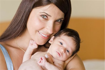 Mother Holding Infant Daughter Foto de stock - Con derechos protegidos, Código: 700-03568032