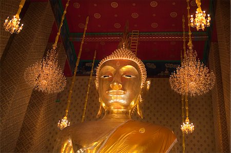 Gold Buddha at Wat Kalayanamitr, Thon Buri, Bangkok, Thailand Stock Photo - Rights-Managed, Code: 700-03586797