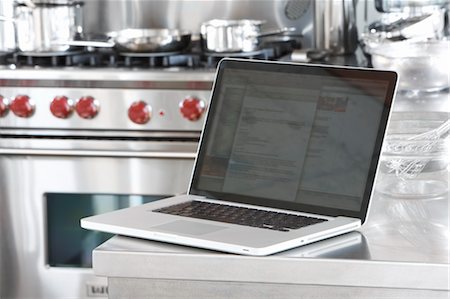 Laptop on Kitchen Counter Stock Photo - Rights-Managed, Code: 700-03587002