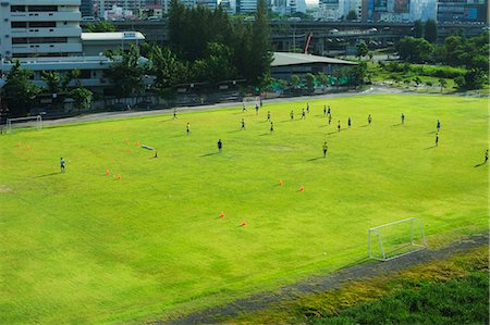 football field - Group of Men Playing Soccer, Bangkok, Thailand Stock Photo - Rights-Managed, Code: 700-03596318