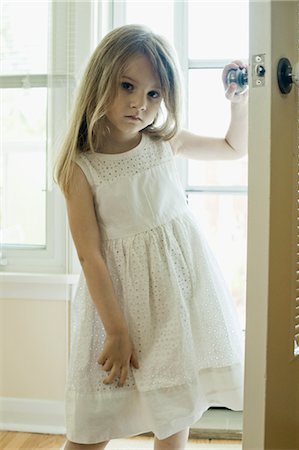 door handle - Little Girl Standing in Doorway Stock Photo - Rights-Managed, Code: 700-03615564