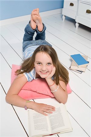 simsearch:700-03615826,k - Girl Reading Book on Floor Stock Photo - Rights-Managed, Code: 700-03615828