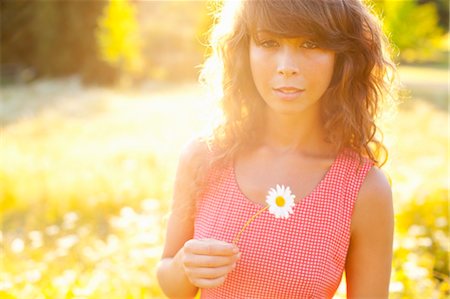 Woman Holding Daisy Stock Photo - Rights-Managed, Code: 700-03613036