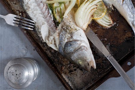 fish slice - Still Life of Baked Trout with Lemon and Fennel Stock Photo - Rights-Managed, Code: 700-03623001