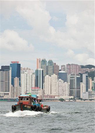 Boat in Harbour, Hong Kong Island, Hong Kong, China Stock Photo - Rights-Managed, Code: 700-03638898